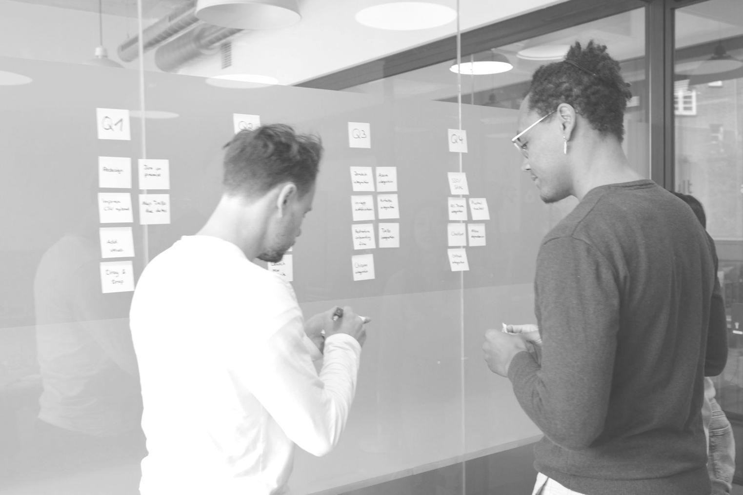 Business planning session with financial documents and strategy materials